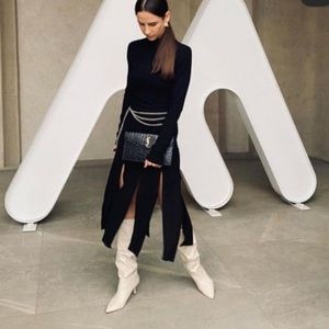 ZARA MIDI SKIRT WITH STRIPS 
High waist Self ties at hem Bloggers favorite